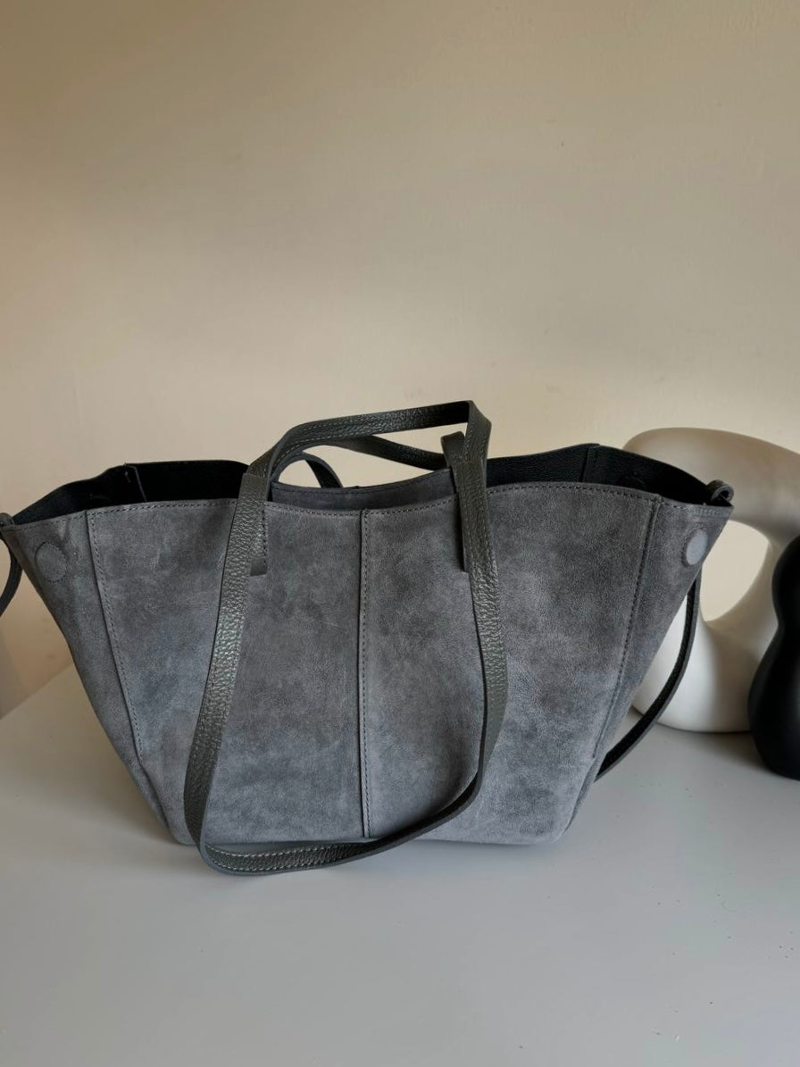 A shopper bag made of natural suede in a fashionable color, Italy