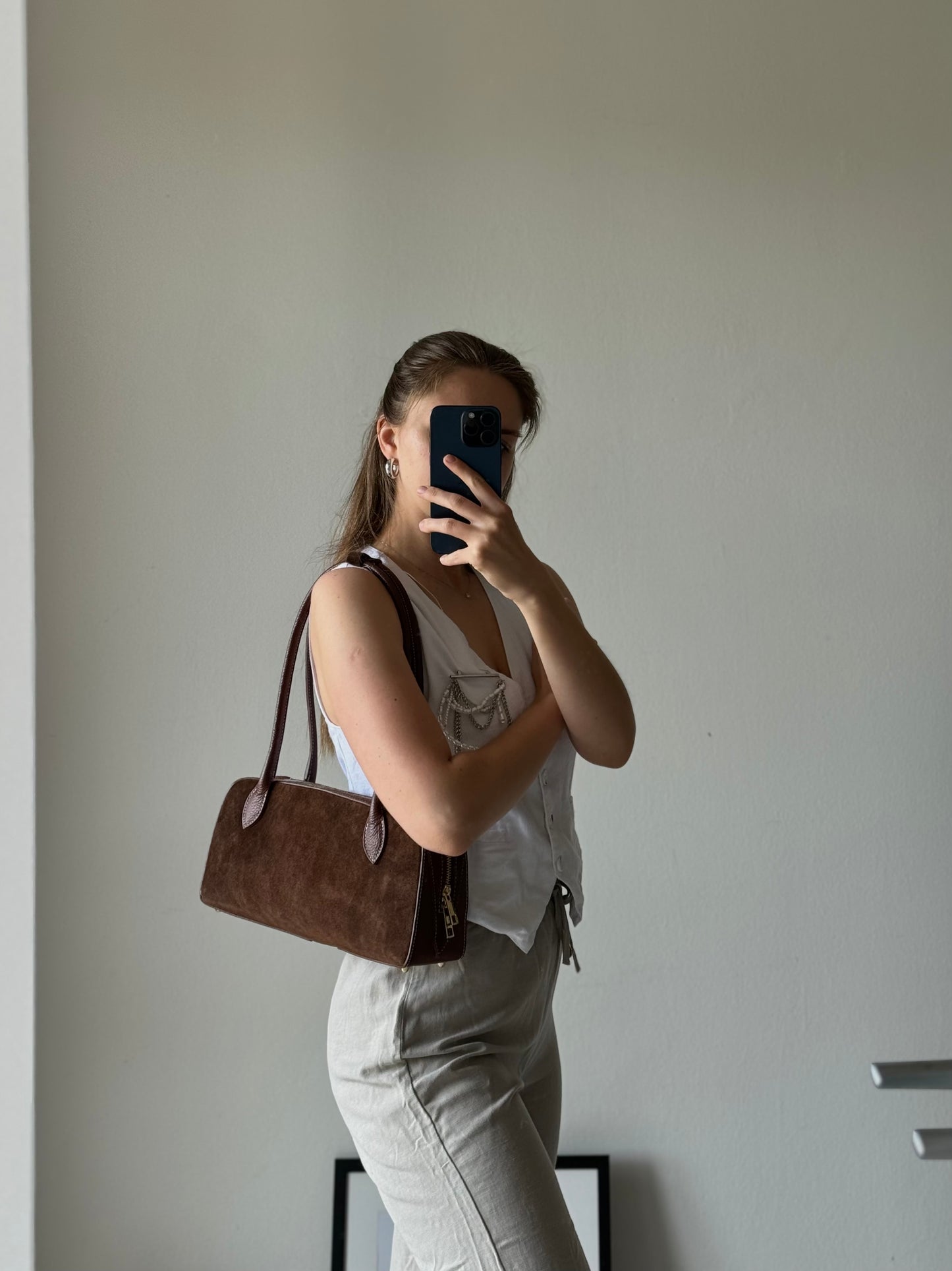 Italian baguette bag made of natural suede in a fashionable color