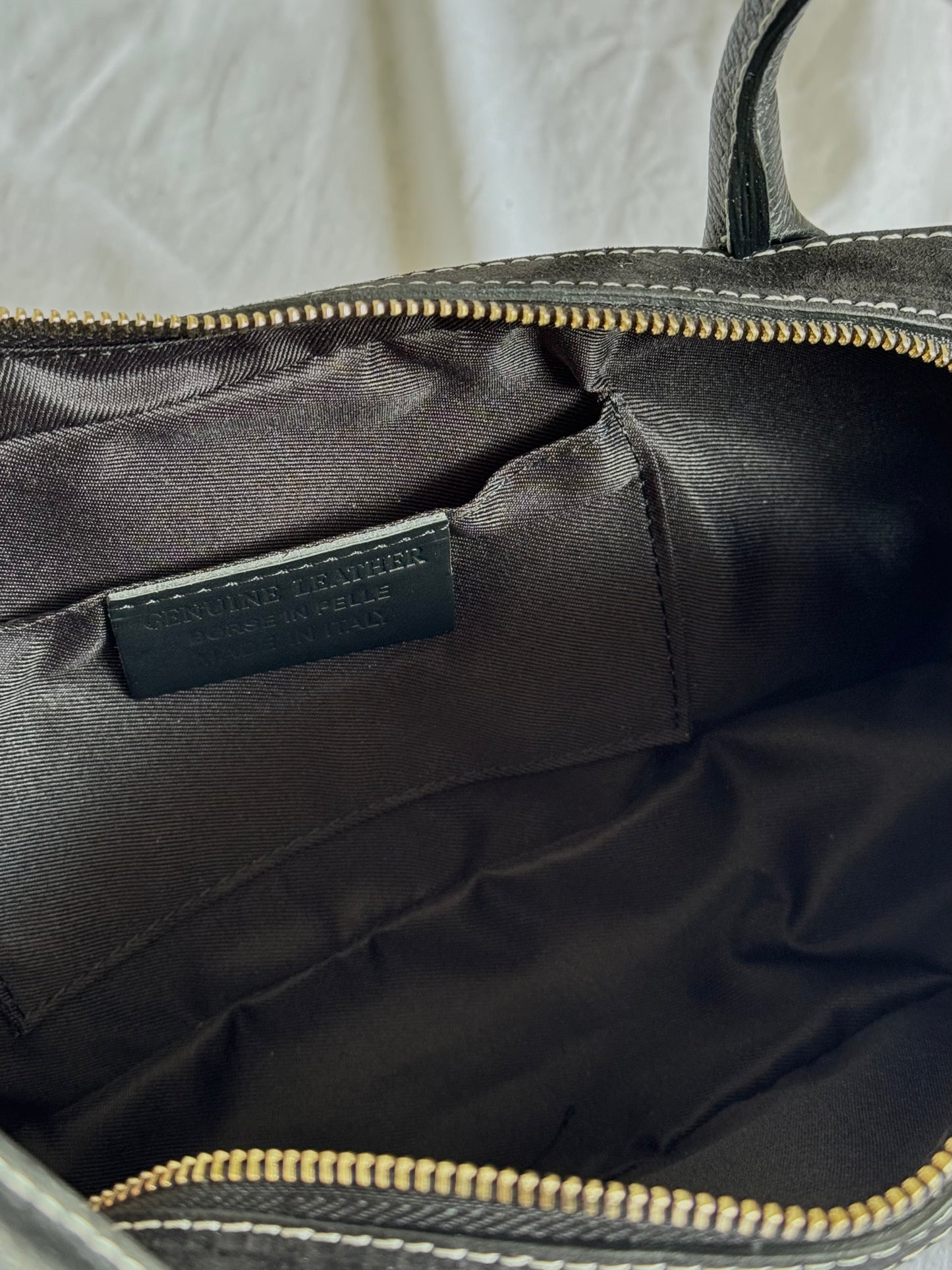 Italian baguette bag made of natural suede in a fashionable color
