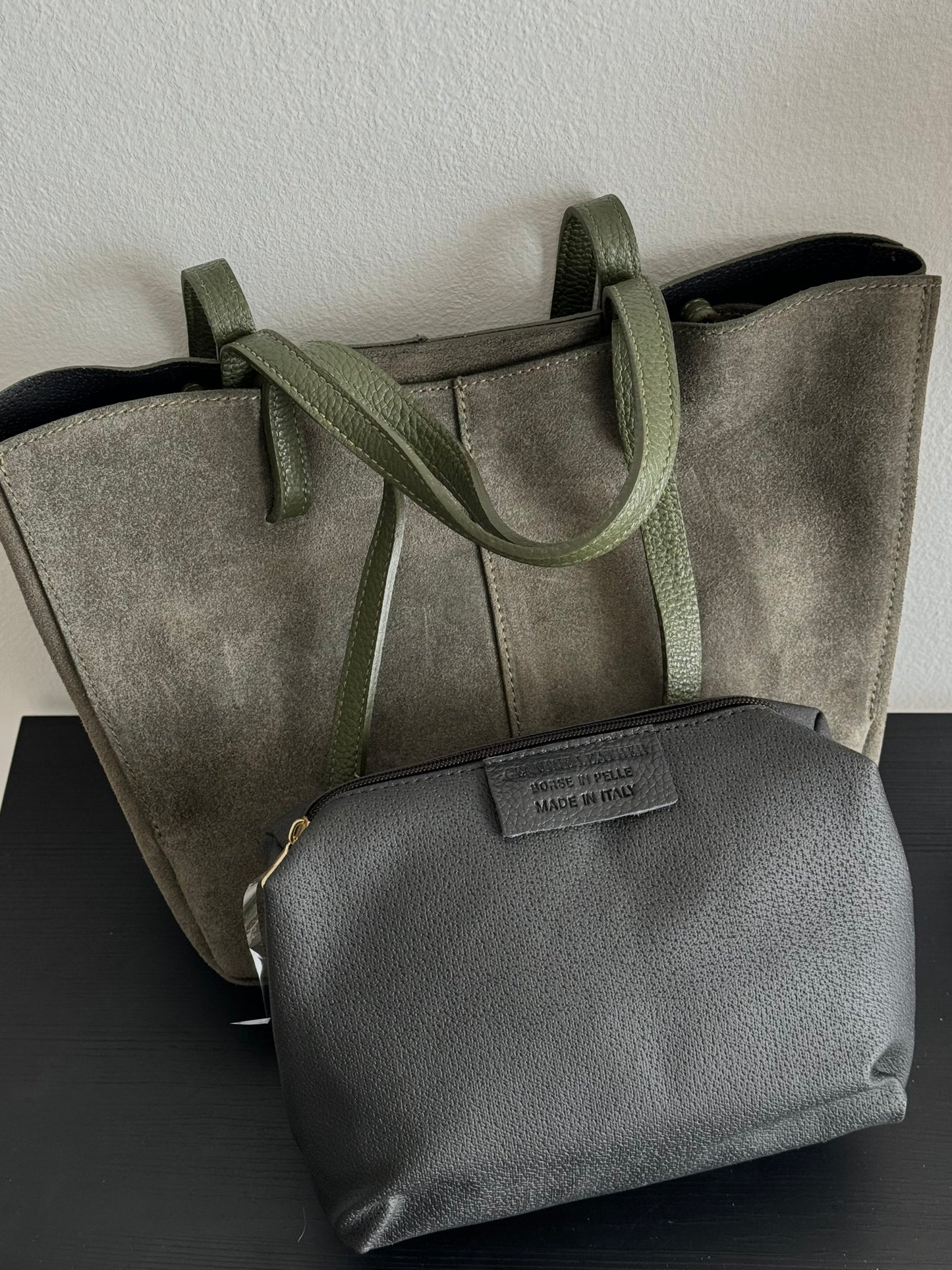 A shopper bag made of natural suede in a fashionable color, Italy