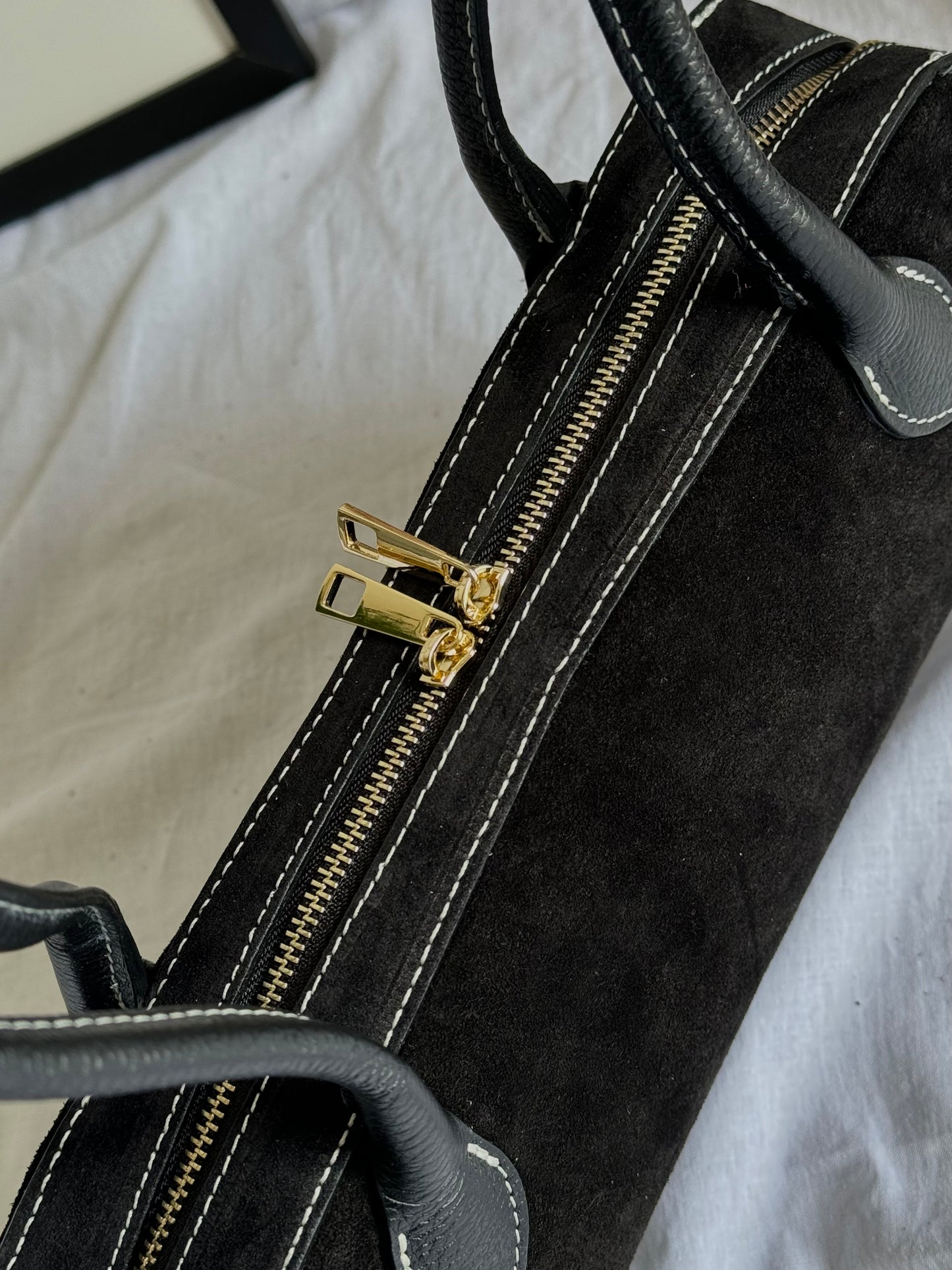 Italian baguette bag made of natural suede in a fashionable color