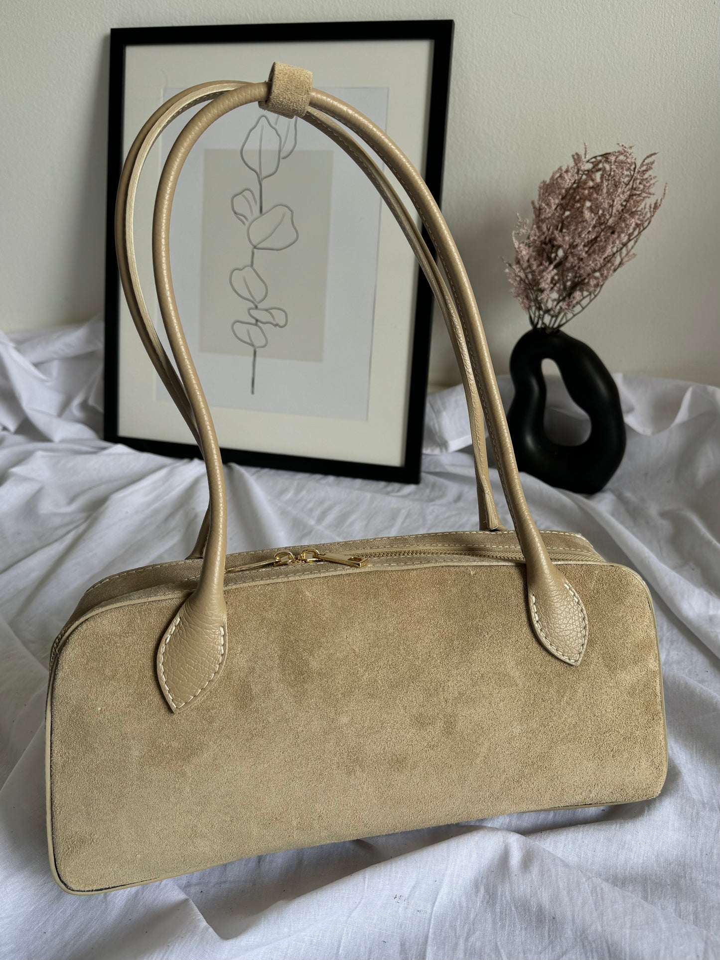 Italian baguette bag made of natural suede in a fashionable color