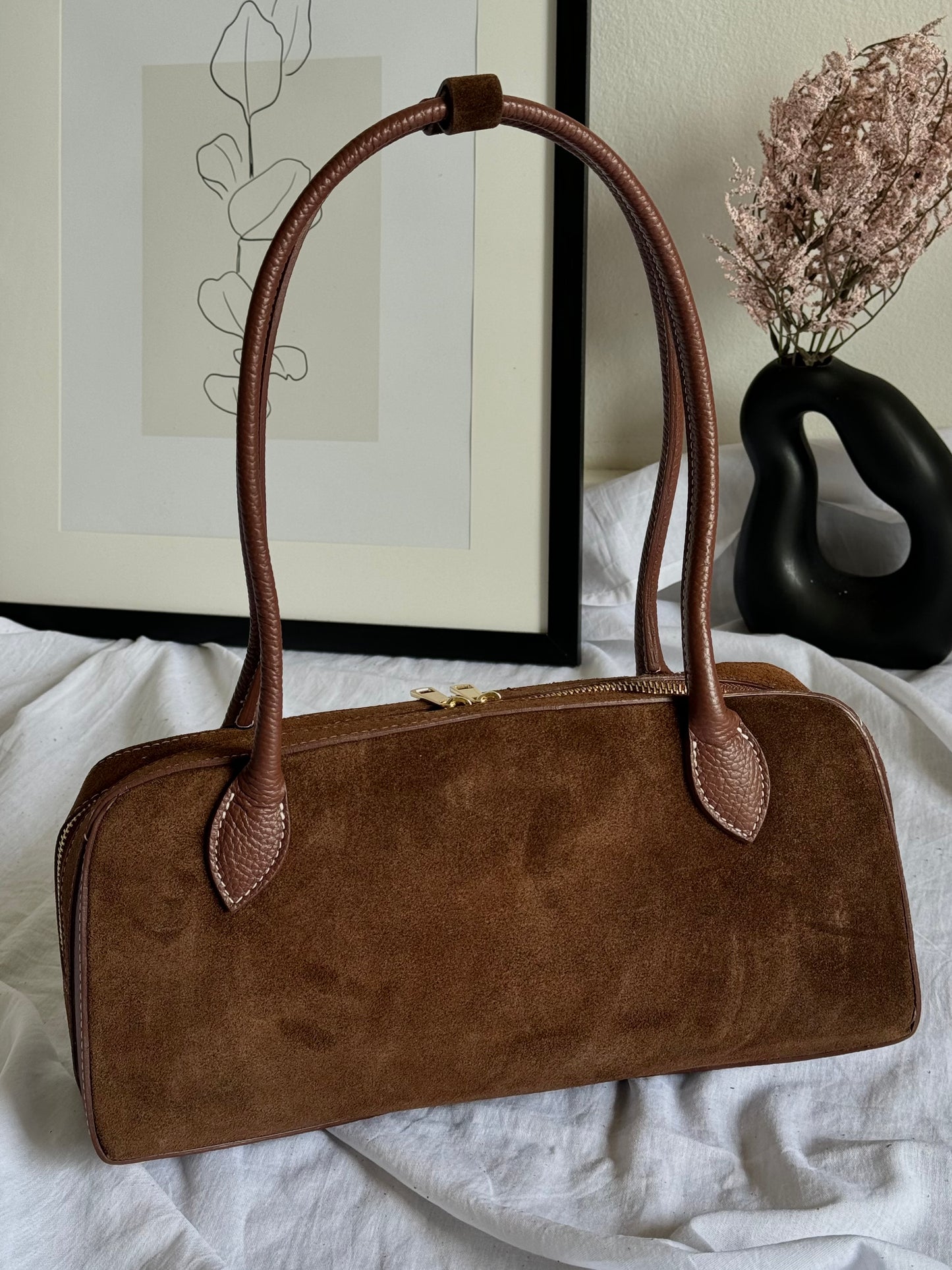 Italian baguette bag made of natural suede in a fashionable color