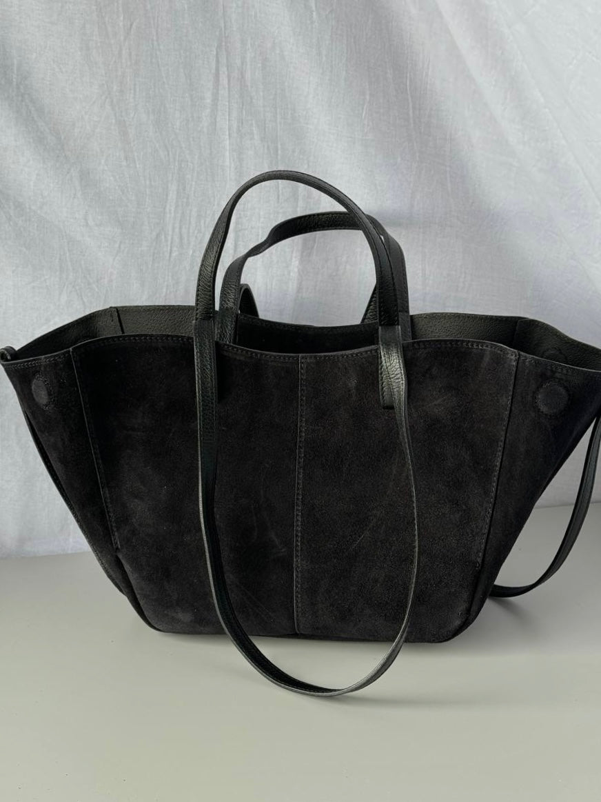 A shopper bag made of natural suede in a fashionable color, Italy